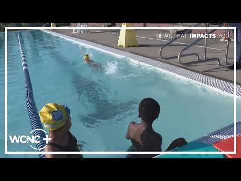 YouTube video thumbnail: All-Black Swim Team Making Waves in Missouri