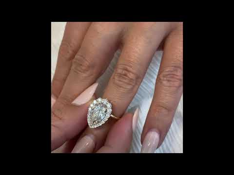 2.80 ct Pear Shape Diamond Graduated Halo Ring