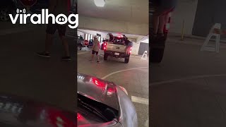 Crowd Helps Weigh Down Too-Tall Truck || ViralHog