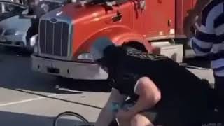 SEMI TRUCK DRIVES THROUGH PEACEFUL PROTEST