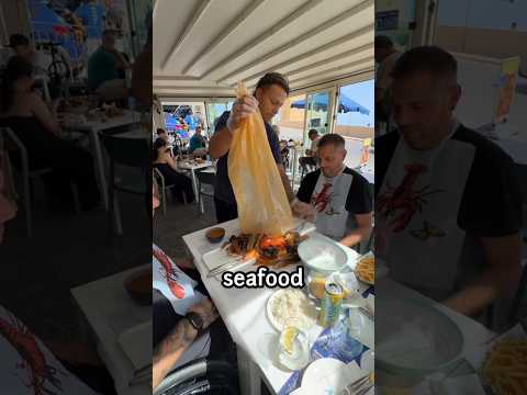 Why did the waiter pour the seafood on the table? #shorts