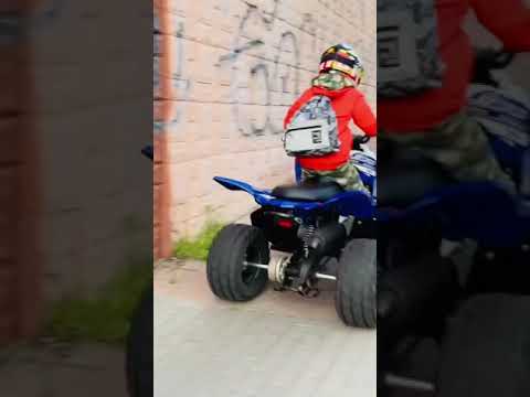 Den ride on Quad Bike on the street