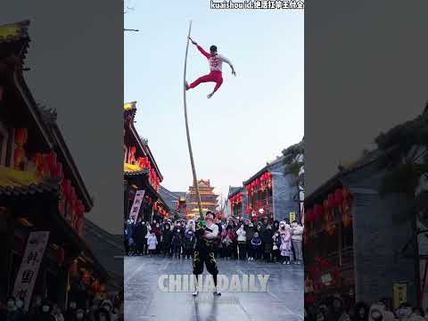 Incredible pole balancing act