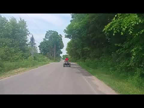 Driving down the road with side by side and four w 