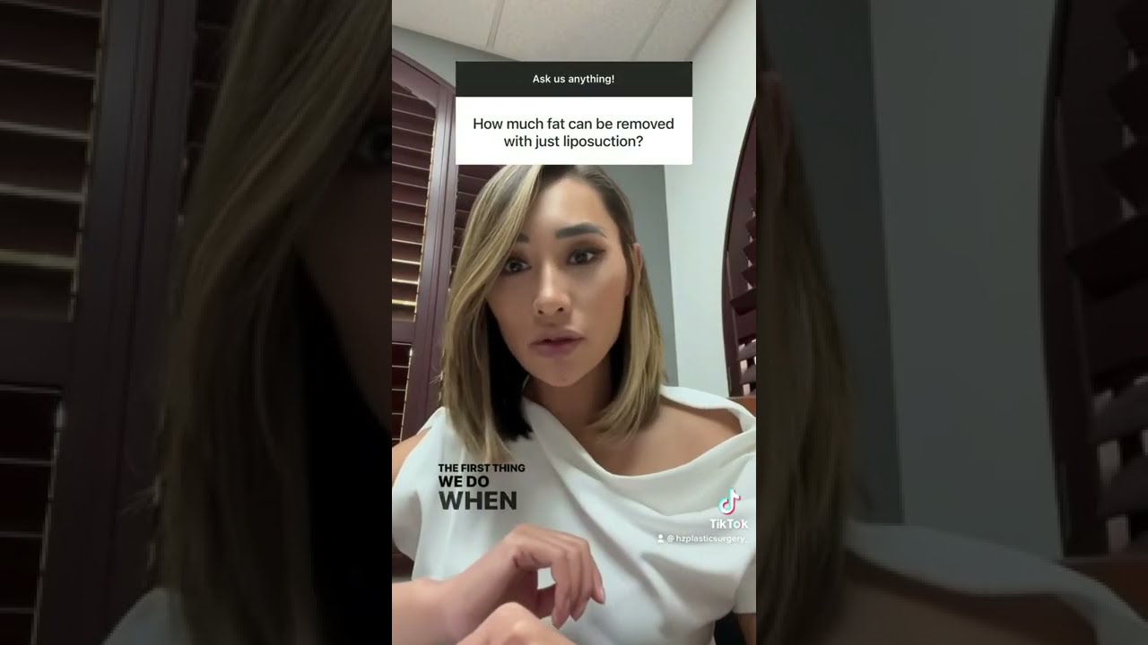 Woman answering questions about liposuction procedures.