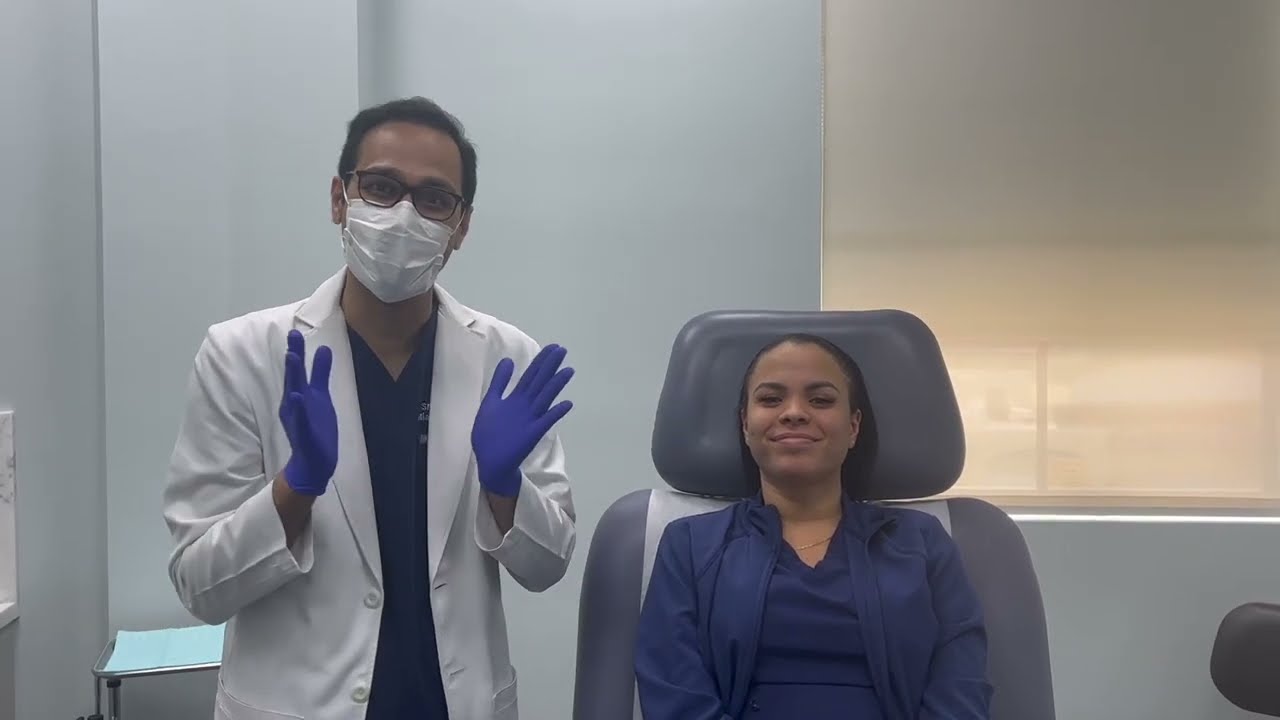Woman with markings for cosmetic procedure preparation.
