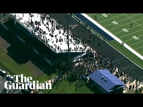 Aerial video shows evacuated students in football field after school shooting in Georgia