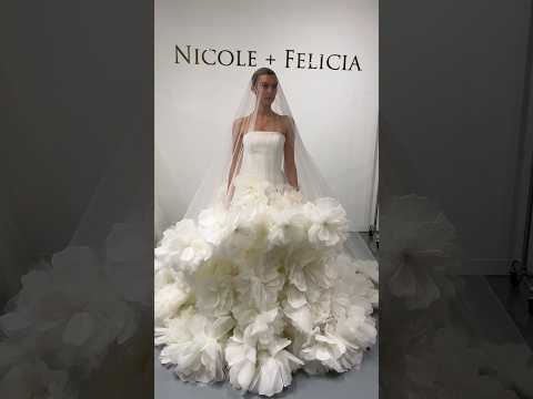 This 3D flower wedding dress is HUGE