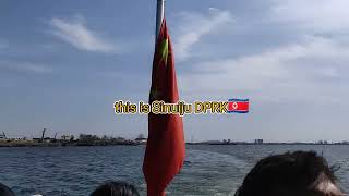 Take  a boat on Yalu River Between Dandong,China and Sinuiju North Korea