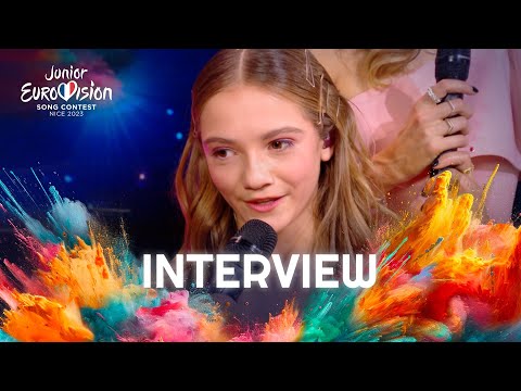 Zoé Clauzure on stage interview with Olivier Minne | Junior Eurovision 2023