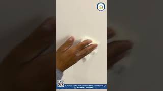 White cladding with hidden door