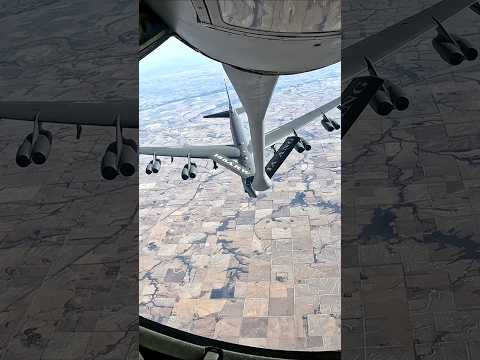 A B-52H from Minot AFB’s 5th Bomb Wing receives fuel from a KC-135 of the Iowa ANG’s 185th AW