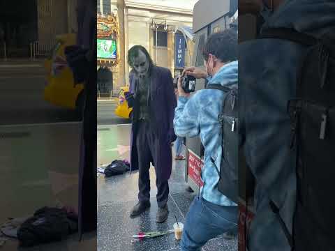 Me: “can I take your picture?” Joker and Batman: