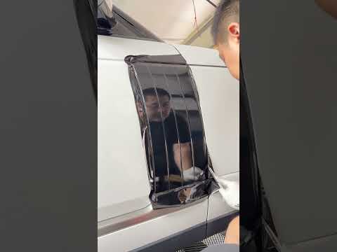 Range Rover accents getting blacked out with 3M gloss black vinyl!