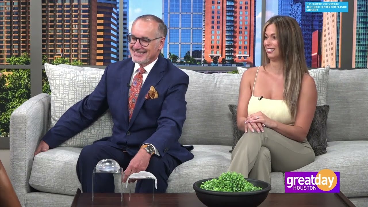 Guests smiling during a television segment.