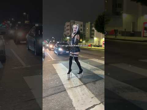 Drag queen crosses the street in DANGEROUS heels 😳