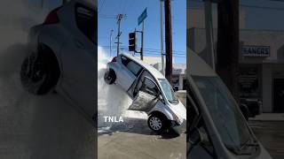 Car Vs Hydrant ends up in air!