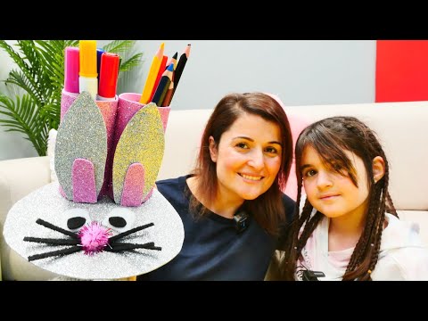 Okul öncesi etkinlik. Banu ve Mina tavşan şeklinde kalemlik hazırlıyorlar. Eğitici video