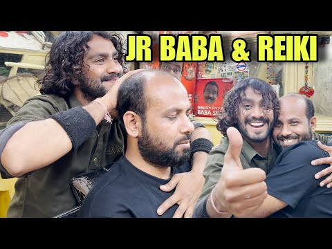 Reiki Master taking cosmic head massage from Jr baba Sen