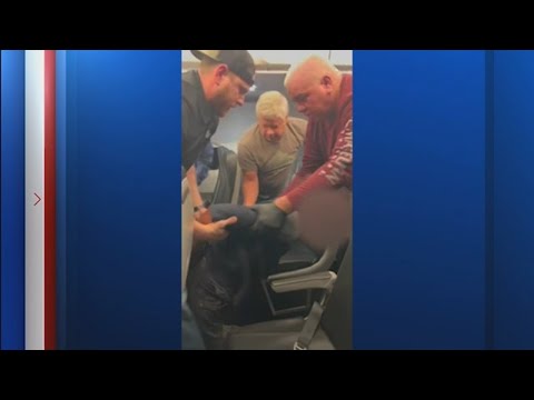 Passengers on Houston-bound flight detain man who punched window and broke plexiglass