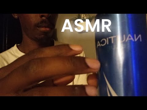 ASMR tapping and whispering with Nautica blue cologne.