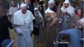 Pope Carries Lamb on Shoulders During Visit to Nativity Scene