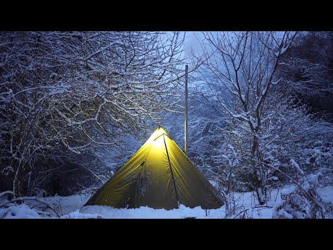 2-Days Winter camping in the snowstorm. Hot Tent at -8 degrees during the night. snowfall, cooking