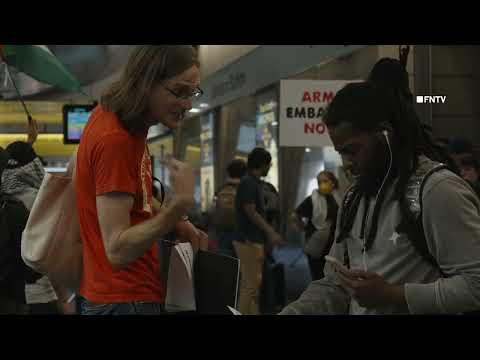 "JFK Bombs" protest outside JFK air Tran, disrupting service speed
