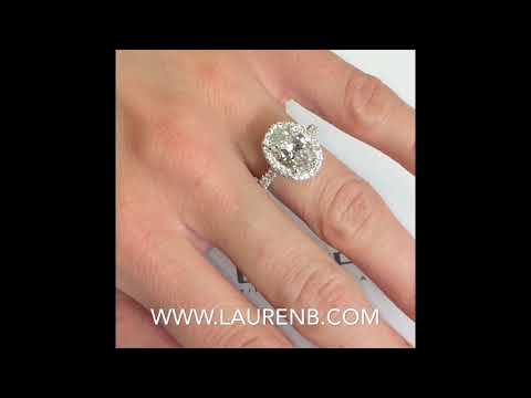 2.6 ct Oval Diamond Halo Ring with Three-Row Band