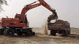 Beautiful Loading of sand by Excavator on Tractor Trolley.