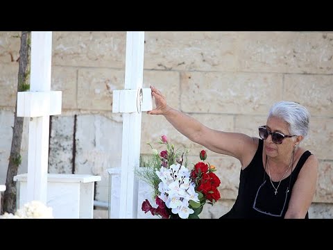 YouTube video thumbnail: Greek and Turkish Cypriots Unite to Restore Cemeteries Along Green Line