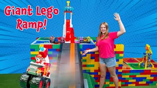 Assistant Builds a Giant Lego Race track for the Paw Patrol Vehicles