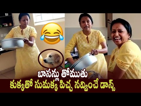 Anchor Suma Hilarious Dance with her Dog while Washing Vessels in Home - Cinema Garage