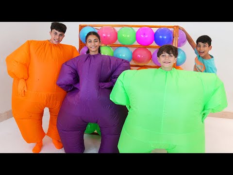 Jason Plays Hide and Seek with Friends in Inflatable Costumes