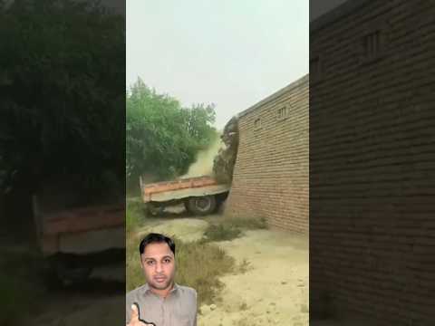 The tractor driver backed the trolley and brought down the house.part1