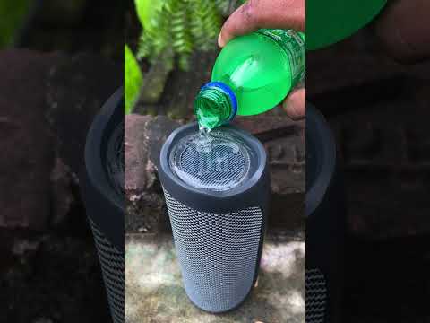 jbl flip essential bass test speaker drink