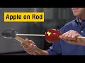 Exploring Newton's First Law with an Apple and Rod