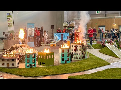 Volcanic Eruption Sparks Firefighting, Vulkanausbruch und Feuerwehreinsatz auf der Messe in Wien