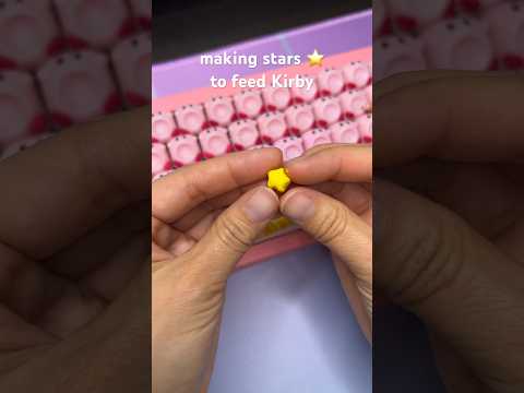 making tiny little clay stars for Kirby