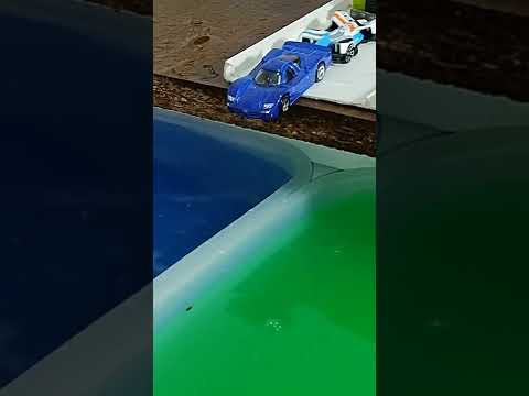 Cars sliding into green and blue water.💦🍭🚀#shorts
