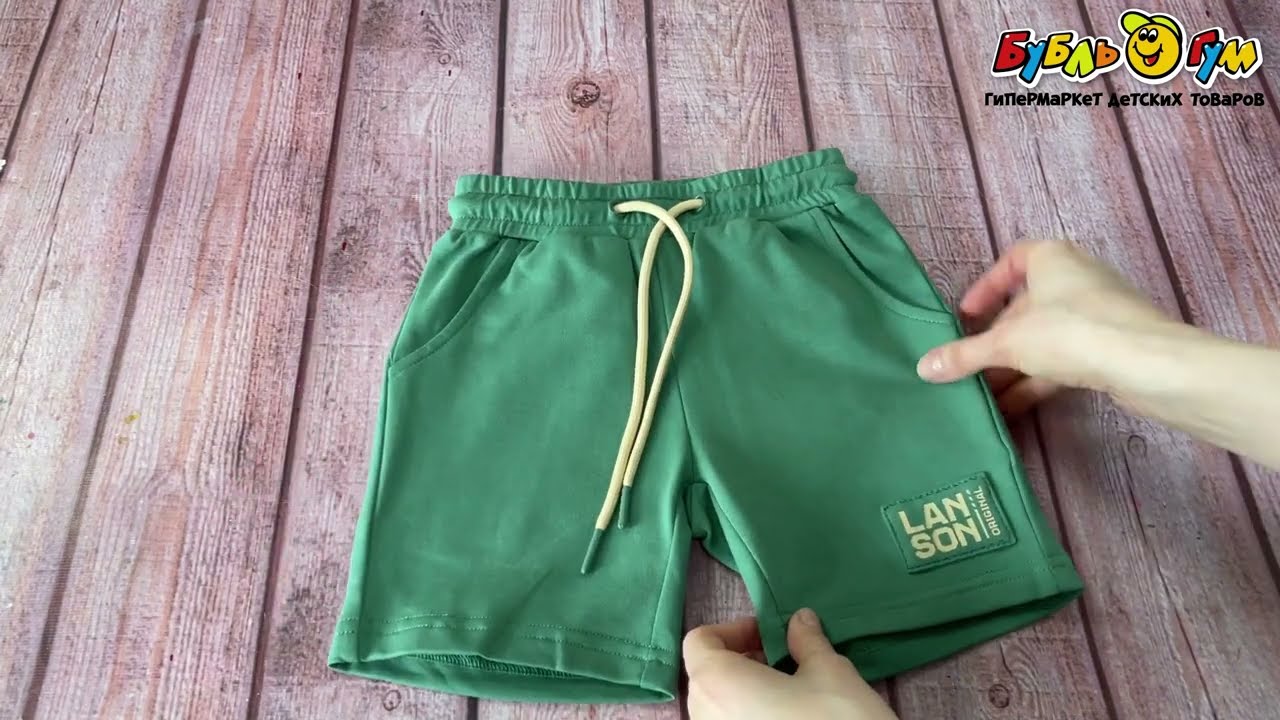 Шорты Lanson Kids с лаконичной нашивкой на завязках зеленые - видео Шорты Lanson Kids с лаконичной нашивкой на завязках зеленые - видео