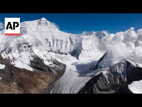 YouTube video thumbnail: Extreme Skier Makes First Skiing Descent of Everest's Most Dangerous Route