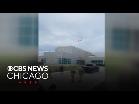 YouTube video thumbnail: Demonstrators Face off With Federal Agents at Hospital in Aurora, Illinois