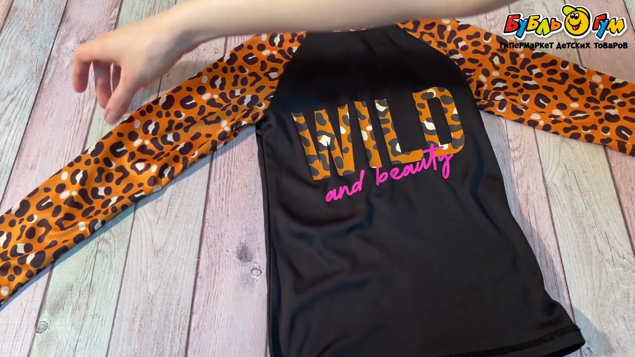 Костюм купальный Lanson Kids раздельный плавки и футболка с длинным рукавом с леопардовыми вставками черный - видео Костюм купальный Lanson Kids раздельный плавки и футболка с длинным рукавом с леопардовыми вставками черный - видео