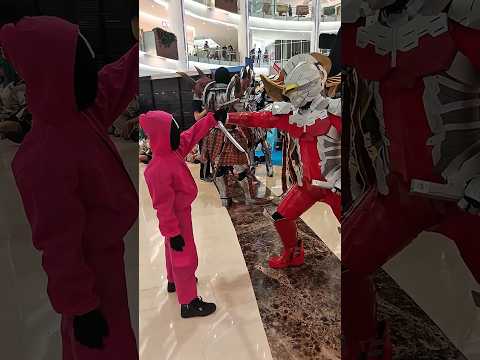 "Pink Guard vs Ultraman (IG : Gopitel_cos)". #squidgame #ultraman #cosplay #shortvideo