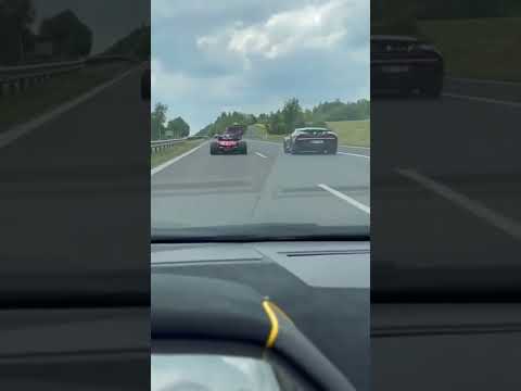 F1 car driving on the Autobahn ๐