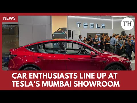 YouTube video thumbnail: Car Enthusiasts Line up at Tesla’s Mumbai Showroom