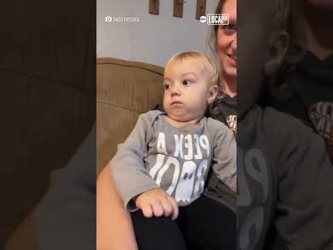 Baby not amused by mom's Lorax costume