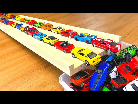 Who will be Faster? A Race of Small Metal Cars on a Slider. Cars Race on a Slope