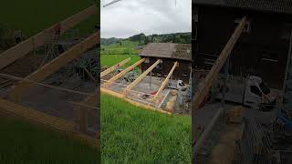 The new wood shed is getting a roof. #Switzerland #farming #alps #Kalberweidli